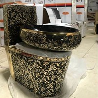 Bồn cầu khối đen hoa văn vàng siêu bóng