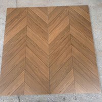 Gạch giả gỗ Trung Quốc 60x120 xương cá nâu đậm mờ