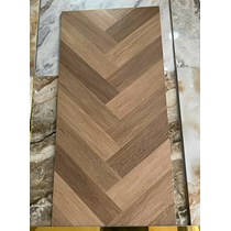 Gạch giả gỗ Trung Quốc 60x120 xương cá nâu mờ